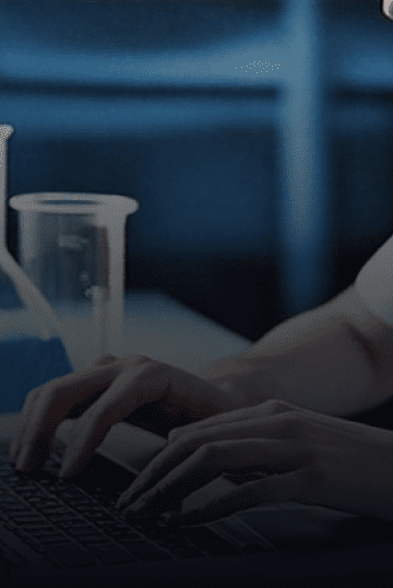 biotech person using laptop